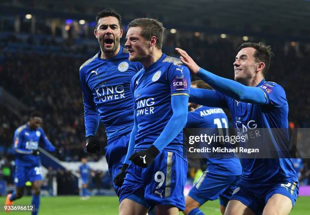 Jamie Vardy of Leicester City celebrates as he scores their first goal with Ben Chilwell and Vicente Iborra during The Emirates FA Cup Quarter Final...