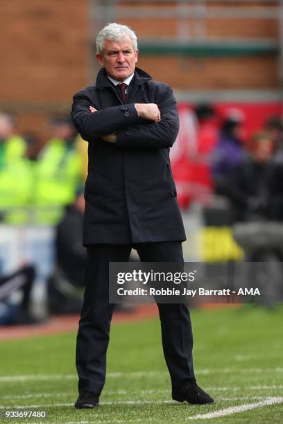 Mark Hughes head coach / manager of Southampton looks on during The Emirates FA Cup Quarter Final match at DW Stadium on March 18, 2018 in Wigan,...