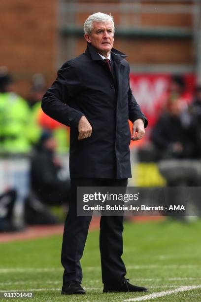 Mark Hughes head coach / manager of Southampton looks on during The Emirates FA Cup Quarter Final match at DW Stadium on March 18, 2018 in Wigan,...