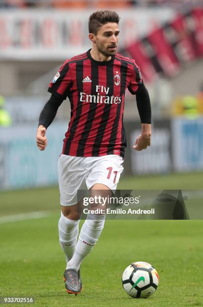 Fabio Borini of AC Milan in action during the serie A match between AC Milan and AC Chievo Verona at Stadio Giuseppe Meazza on March 18, 2018 in...