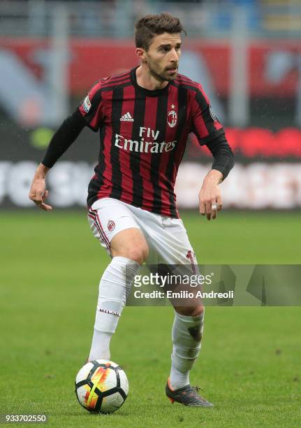 Fabio Borini of AC Milan in action during the serie A match between AC Milan and AC Chievo Verona at Stadio Giuseppe Meazza on March 18, 2018 in...