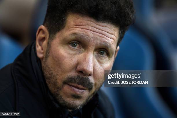 Atletico Madrid's Argentinian coach Diego Simeone sits on the bench before the Spanish League football match between Villarreal CF and Club Atletico...