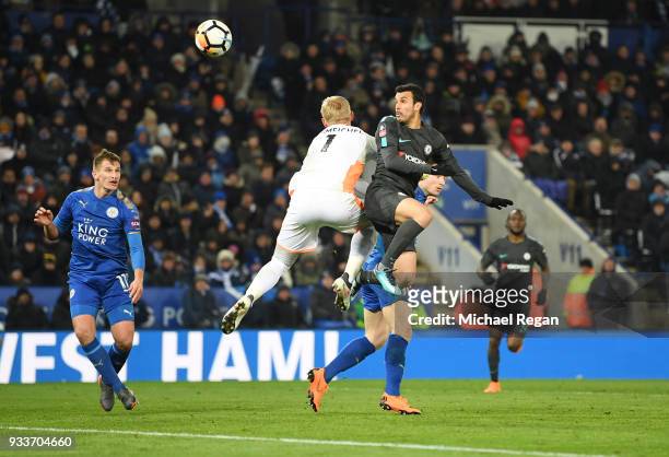 Pedro of Chelsea beats Kasper Schmeichel of Leicester City to score their second goal during The Emirates FA Cup Quarter Final match between...