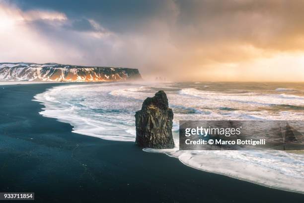 the black beach of reynisfjara, vik, iceland - black sand stock pictures, royalty-free photos & images