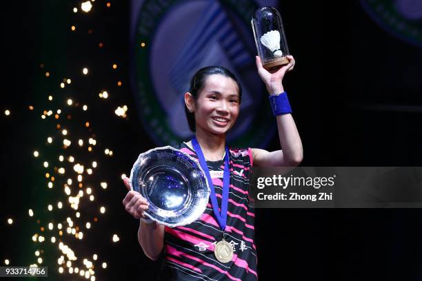 Tai Tzu Ying of Chinese Taipei celebrates with the trophy after beating Akane Yamaguchi of Japan in the women's singles final on day 5 of the Yonex...