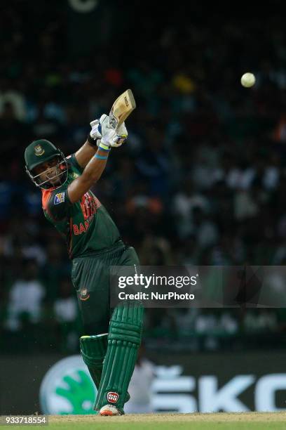 Bangladesh cricketer Sabbir Rahman Sabbir plays a shot during the final Twenty-20 cricket match of NIDAHAS Trophy between Bangladesh and India at R...