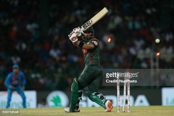 Bangladesh cricketer Sabbir Rahman is bowled out during the final Twenty-20 cricket match of NIDAHAS Trophy between Bangladesh and India at R...