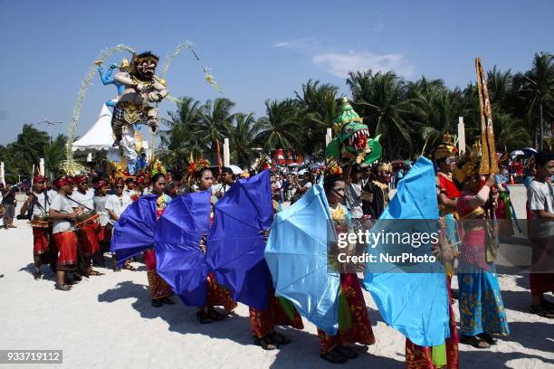 Balinesse Dancer perform during an Effigy festival, known as Ogoh-ogoh, at Ancol beach, North Jakarta, on Sunday, March 18, 2018. The first effigy...