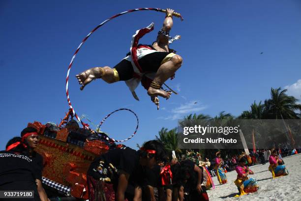 Participant carrying a giant Effigy, known as Ogoh-ogoh, during an Effigy festival at Ancol beach, North Jakarta, on Sunday, March 18, 2018. The...