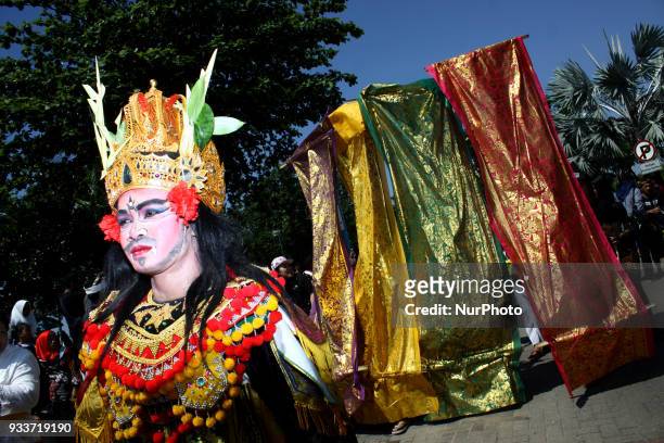 Balinesse Dancer perform during an Effigy festival, known as Ogoh-ogoh, at Ancol beach, North Jakarta, on Sunday, March 18, 2018. The first effigy...