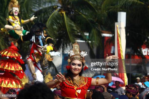 Balinesse Dancer perform during an Effigy festival, known as Ogoh-ogoh, at Ancol beach, North Jakarta, on Sunday, March 18, 2018. The first effigy...