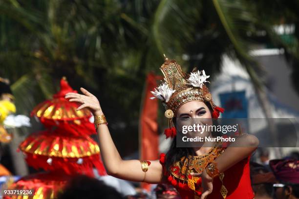 Balinesse Dancer perform during an Effigy festival, known as Ogoh-ogoh, at Ancol beach, North Jakarta, on Sunday, March 18, 2018. The first effigy...
