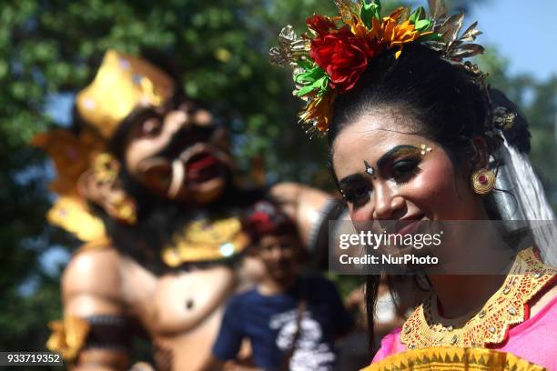 Balinesse Dancer perform during an Effigy festival, known as Ogoh-ogoh, at Ancol beach, North Jakarta, on Sunday, March 18, 2018. The first effigy...