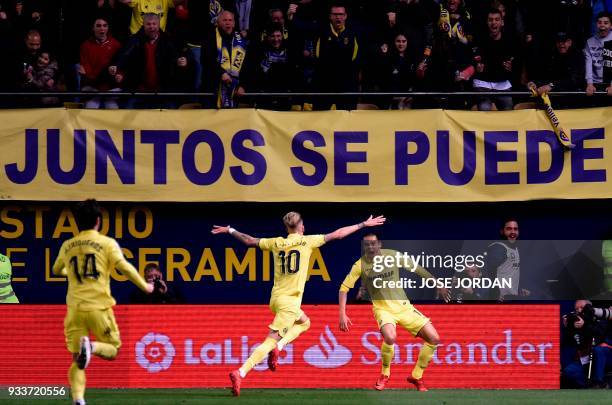 Villarreal's Turkish forward Enes Unal celebrates scoring his team's secong goal during the Spanish League football match between Villarreal CF and...