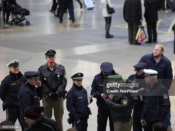 Group of policemen. About 30-40 people protested spontaneously at the Munich Central Station against turkish war against Afrin in northern Syria. The...