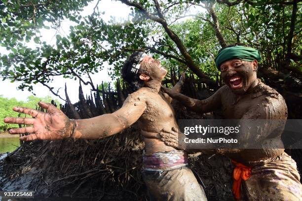 The first day of New Year of Caka 1940, people in Kedonganan Village, Bali held a 'Mabuug-buugan' ritual by smearing their bodies with mud, on March...