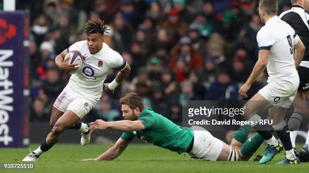 Anthony Watson of England moves away from Iain Henderson during the NatWest Six Nations match between England and Ireland at Twickenham Stadium on...