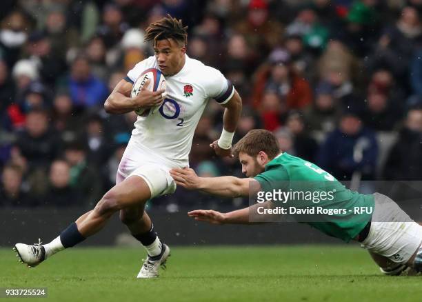 Anthony Watson of England moves away from Iain Henderson during the NatWest Six Nations match between England and Ireland at Twickenham Stadium on...