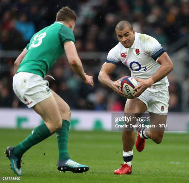 Jonathan Joseph of England takes on Garry Ringrose during the NatWest Six Nations match between England and Ireland at Twickenham Stadium on March...