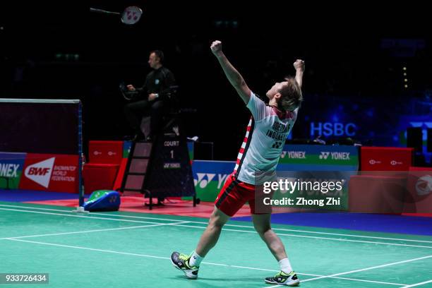 Marcus Fernaldi Gideon of Indonesia reacts with Kevin Sanjaya Sukamuljo of Indonesia after winning over Mathias Boe of Denmark and Carsten Mogensen...