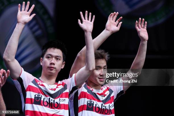 Marcus Fernaldi Gideon of Indonesia and Kevin Sanjaya Sukamuljo of Indonesia react after winning over Mathias Boe of Denmark and Carsten Mogensen of...