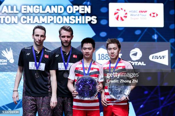 Mathias Boe of Denmark and Carsten Mogensen of Denmark, and Kevin Sanjaya Sukamuljo of Indonesia and Marcus Fernaldi Gideon of Indonesia pose for...