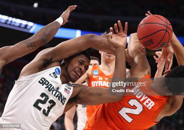 Xavier Tillman of the Michigan State Spartans battles for a rebound with Matthew Moyer of the Syracuse Orange during the first half in the second...