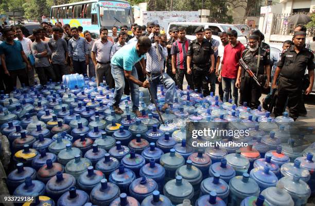 Sub-standard water jars are being destroyed at Matsya Bhaban road in Dhaka, Bangladesh, on 18 March 2018 during a raid conducted by district...