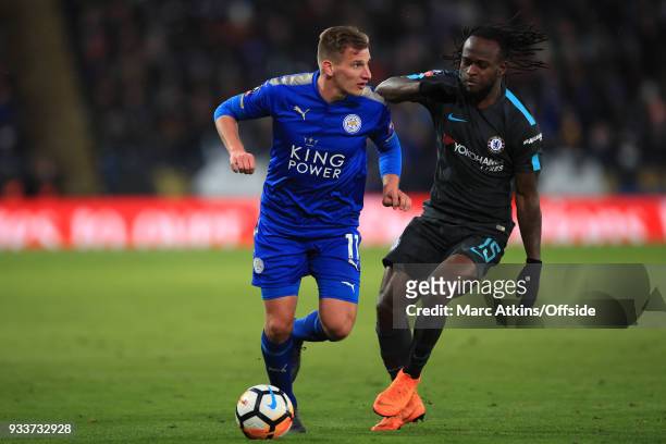 Marc Albrighton of Leicester City in action with Victor Moses of Chelsea during the Emirates FA Cup Quarter Final match between Leicester City and...
