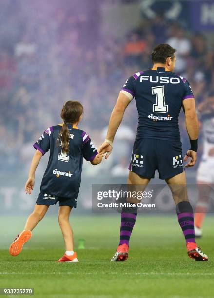 Billy Slater and his daughter Tyla Rose are seen prior to match start during the round two NRL match between the Melbourne Storm and the Wests Tigers...