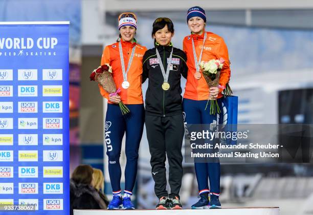 Marrit Leenstra of the Netherlands, Miho Takagi of Japan and Lotte van Beek of the Netherlands stand on the podium after the Ladies 1500m Final...