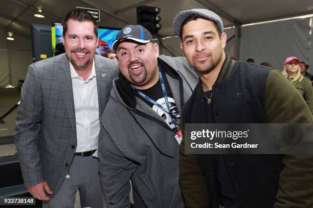 Dave Allen, Gabriel Iglesias, and Wilmer Valderama pose for a photo during the driver's meeting prior to the Monster Energy NASCAR Cup Series Auto...