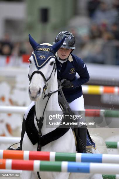 Louise Saywell of Great Britain on Ushuaia d'Aurel competes during the Saut Hermes at Le Grand Palais on March 18, 2018 in Paris, France.