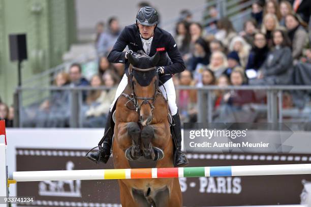 Marc Houtzager of the Netherlands on Sterrehof's Calimero competes during the Saut Hermes at Le Grand Palais on March 18, 2018 in Paris, France.