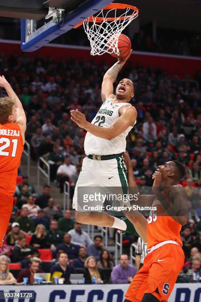 Miles Bridges of the Michigan State Spartans dunks the ball during the second half against the Syracuse Orange in the second round of the 2018 NCAA...