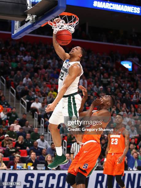 Miles Bridges of the Michigan State Spartans dunks the ball during the second half against the Syracuse Orange in the second round of the 2018 NCAA...