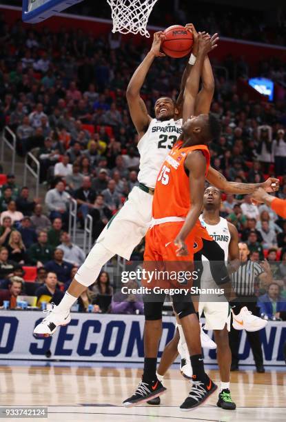 Xavier Tillman of the Michigan State Spartans battles for the ball with Bourama Sidibe of the Syracuse Orange during the second half in the second...