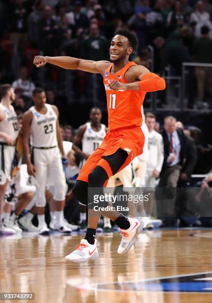 Oshae Brissett of the Syracuse Orange celebrates defeating the Michigan State Spartans 55-53 in the second round of the 2018 NCAA Men's Basketball...