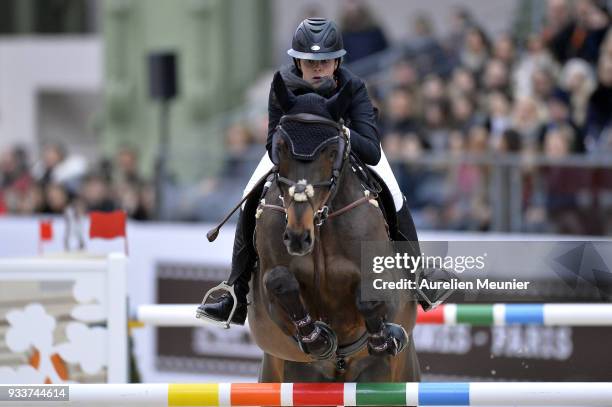 Jessie Drea of Great Britain on Mullaghdrin Touch The Stars competes during the Saut Hermes at Le Grand Palais on March 18, 2018 in Paris, France.