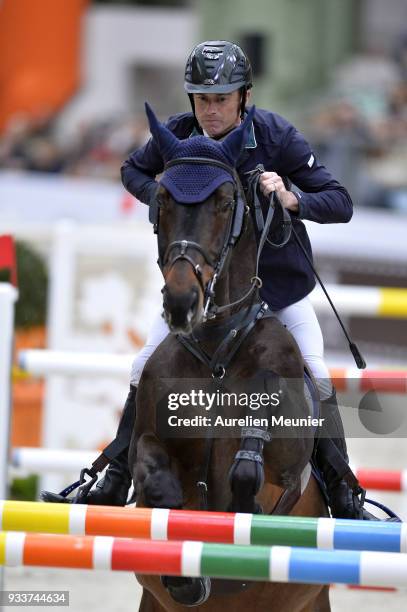 Denis Lynch of Ireland on Van Helsing competes during the Saut Hermes at Le Grand Palais on March 18, 2018 in Paris, France.