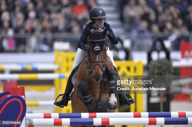 Janika Sprunger of Switzerland on Bacardi VDL competes during the Saut Hermes at Le Grand Palais on March 18, 2018 in Paris, France.