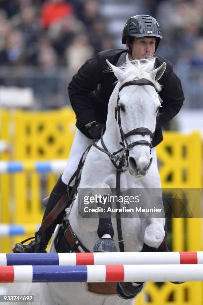 Andy Kocher of the United States Of America on Navalo de Poheton competes during the Saut Hermes at Le Grand Palais on March 18, 2018 in Paris,...