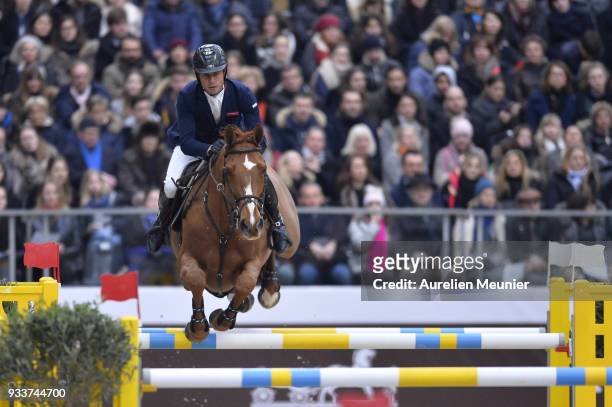 Julien Epaillard of France on Usual Suspect d Auge competes during the Saut Hermes at Le Grand Palais on March 18, 2018 in Paris, France.