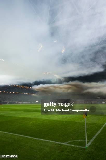 General view of Friends Arena filled with smoke from flares during a semi-final match of the Swedish Cup between AIK and Djurgardens IF at Friends...