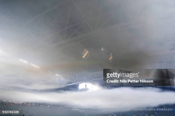 Smoke from flares fills the arena ahead of the Swedish Cup Semifinal between AIK and Djurgardens IF at Friends arena on March 18, 2018 in Solna,...