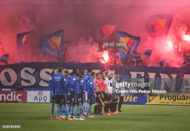 Players line up ahead of during the Swedish Cup Semifinal between AIK and Djurgardens IF at Friends arena on March 18, 2018 in Solna, Sweden.