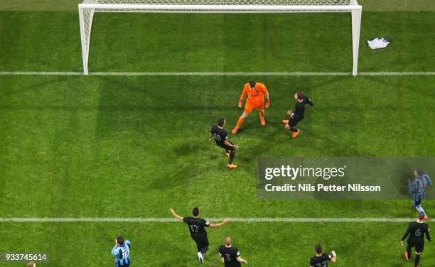 Oscar Linner of AIK celebrates after saving a penalty shot during the Swedish Cup Semifinal between AIK and Djurgardens IF at Friends arena on March...