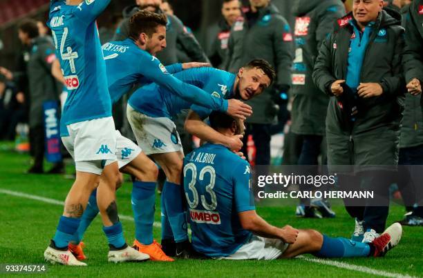 Napoli's Spanish defender Raul Albiol celebrates with teammates after scoring during the Italian Serie A football match SSC Napoli vs Genoa CFC on...