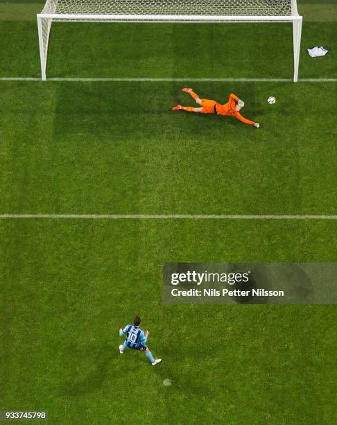 Oscar Linner of AIK makes a save on a penalty shot by Kerim Mrbati of Djurgardens IF during the Swedish Cup Semifinal between AIK and Djurgardens IF...