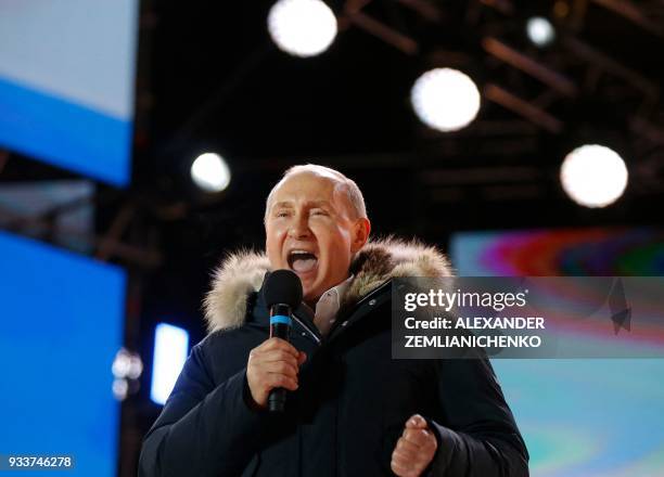 Presidential candidate, President Vladimir Putin addresses the crowd during a rally and a concert celebrating the fourth anniversary of Russia's...